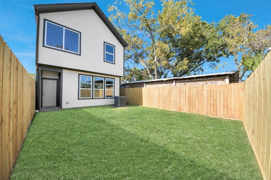 Exterior details and patio area of a home in , Houston (Image 2). Exterior details and patio area of a home in , Houston (Image 2).