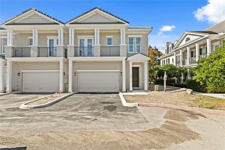 Front exterior of a new home in , St. Petersburg, FL, highlighting curb appeal (Image 28). Front exterior of a new home in , St. Petersburg, FL, highlighting curb appeal (Image 28).