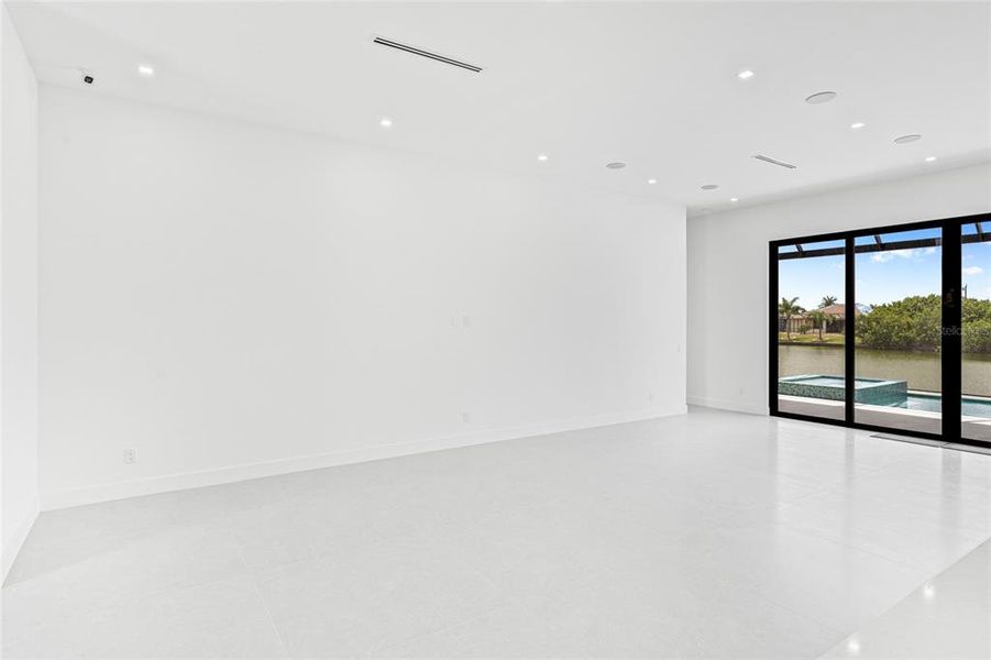 Spacious, unfurnished interior of a new home in , Port Charlotte (Image 63).