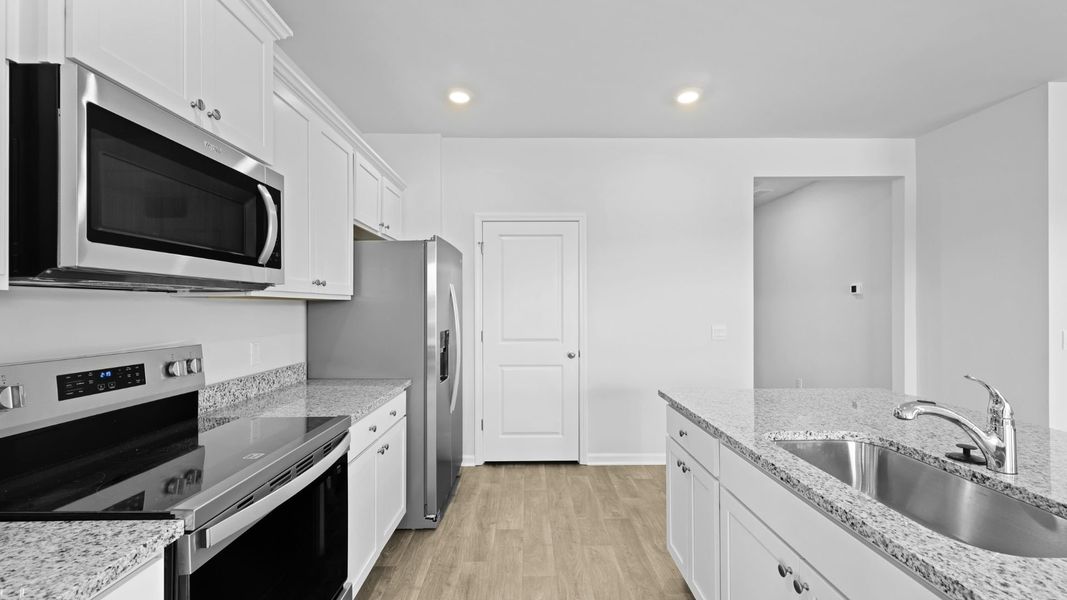 Representative furnished interior of a home built from the ARIA by D.R. Horton in The Ranch, Holly Hill (Image 6).