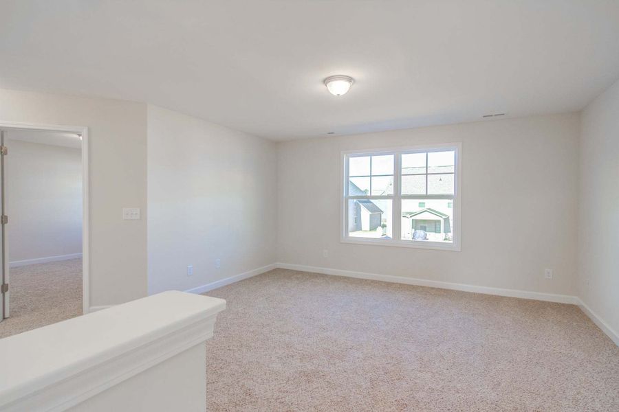 Representative unfurnished interior of a home built from the Drayton by Caviness & Cates Communities in Bartlett Manor, Youngsville (Image 196).