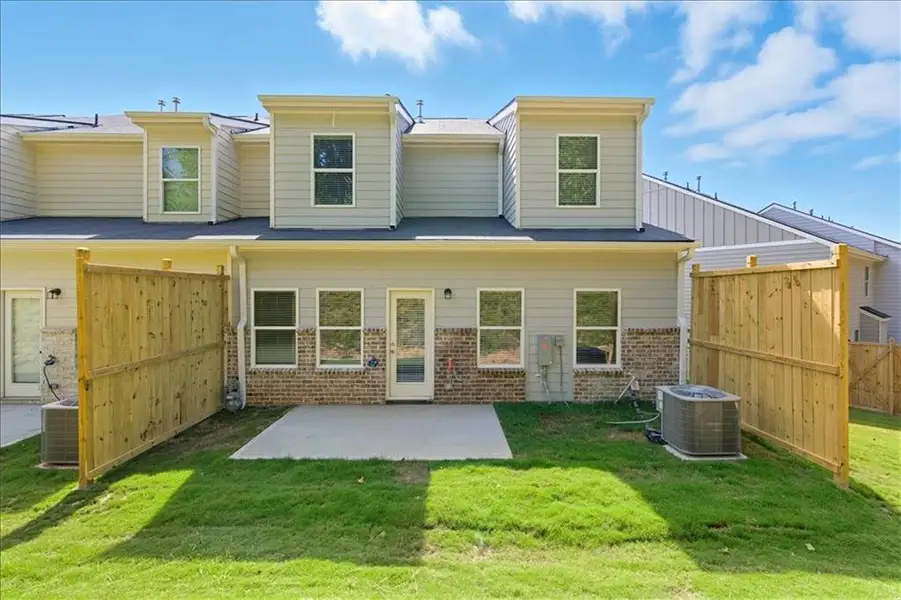 Exterior details and patio area of a home in Park Center Pointe, Mableton (Image 3).