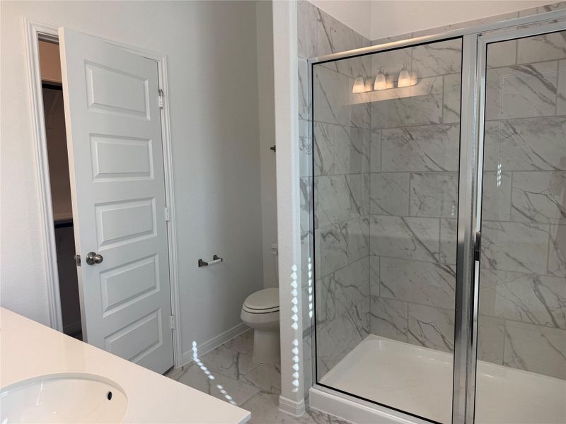 Furnished interior view inside a new home in East Gate Villas, Willis (Image 9).