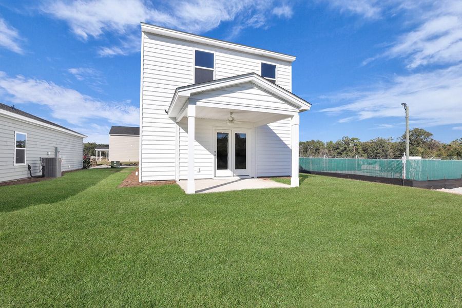 Exterior details and patio area of a home in Central Creek, Goose Creek (Image 3).