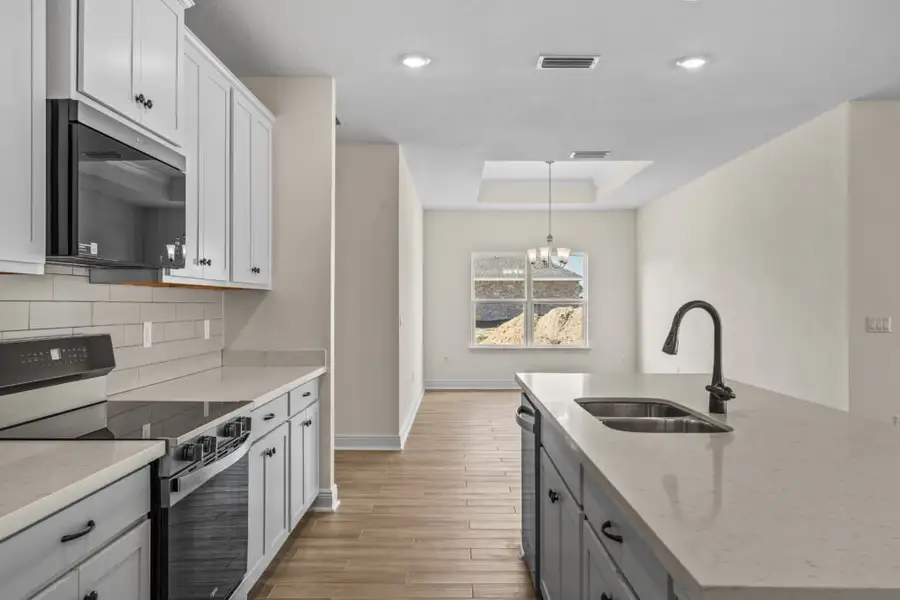 Furnished interior view inside a new home in Natureview, Freeport (Image 3).