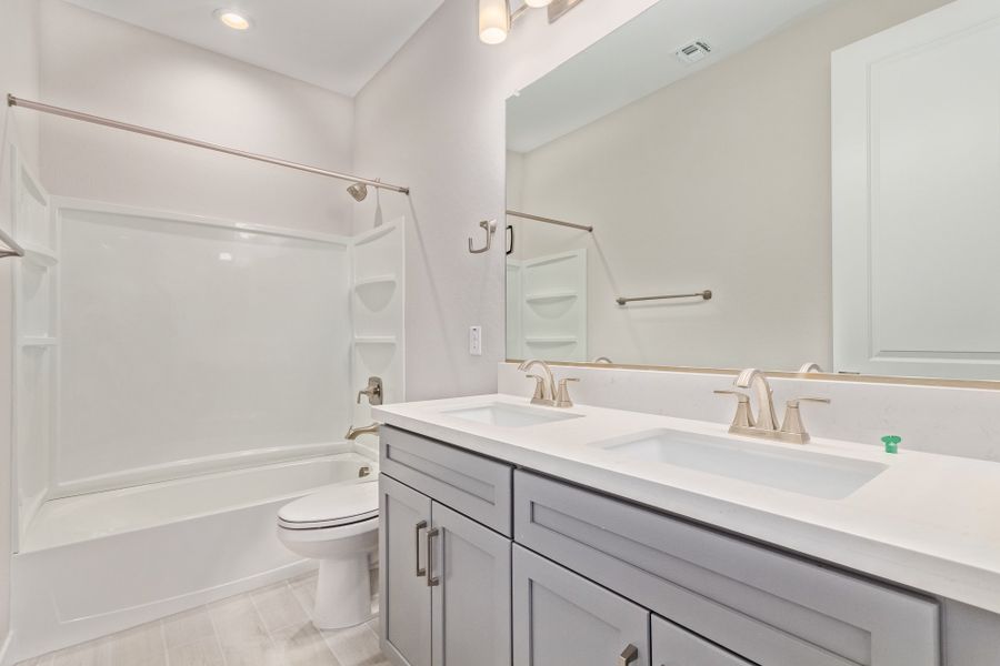 Representative furnished interior of a home built from the Lily by Taylor Morrison in CantaMia at Estrella 55+, Goodyear (Image 4).