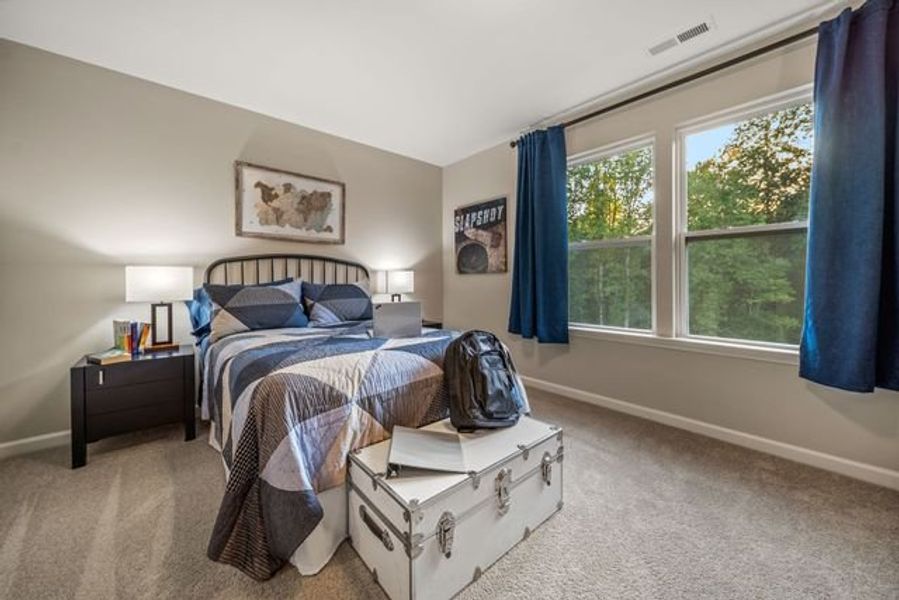 Representative furnished interior of a home built from the Kipling by True Homes in Whispering Hills, Locust (Image 16).