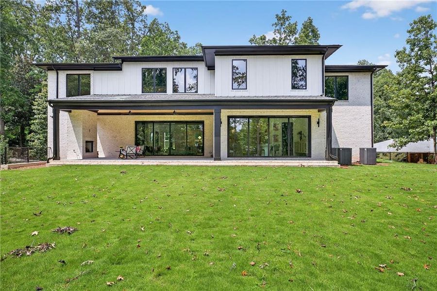 Front exterior of a new home in , Brookhaven, GA, highlighting curb appeal (Image 25). Front exterior of a new home in , Brookhaven, GA, highlighting curb appeal (Image 25).