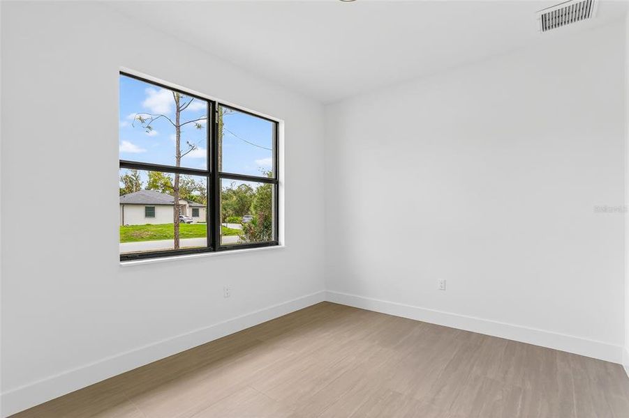 Spacious, unfurnished interior of a new home in , Port Charlotte (Image 48).