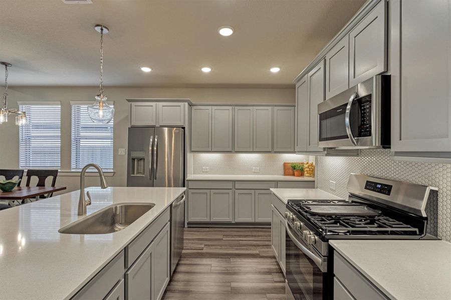 Furnished interior view inside a new home in The Highlands - Grove Collection, Porter (Image 8).