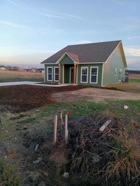 Ranch-style house with central AC unit