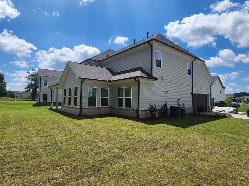 Front exterior of a new home in , Duluth, GA, highlighting curb appeal (Image 20). Front exterior of a new home in , Duluth, GA, highlighting curb appeal (Image 20).