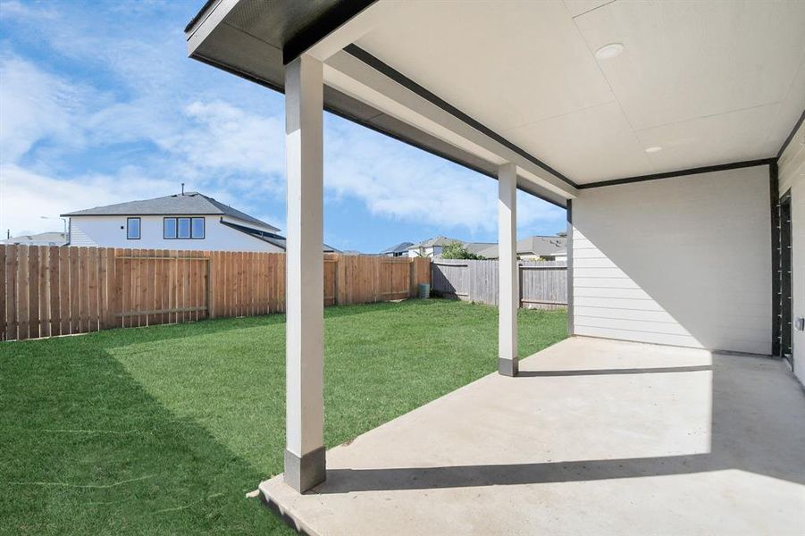 Experience outdoor living at its finest on this expansive covered patio,thoughtfully designed for BBQs and delightful outdoor dining