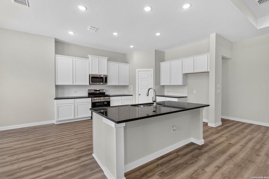 Furnished interior view inside a new home in Jordan's Ranch, San Antonio (Image 10).