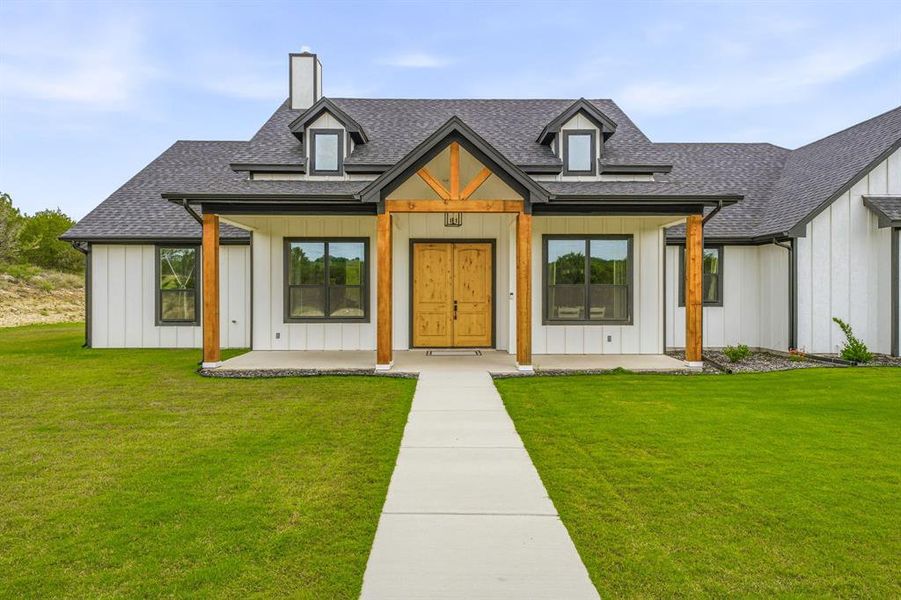Front exterior of a new home in , Bluff Dale, TX, highlighting curb appeal (Image 21).