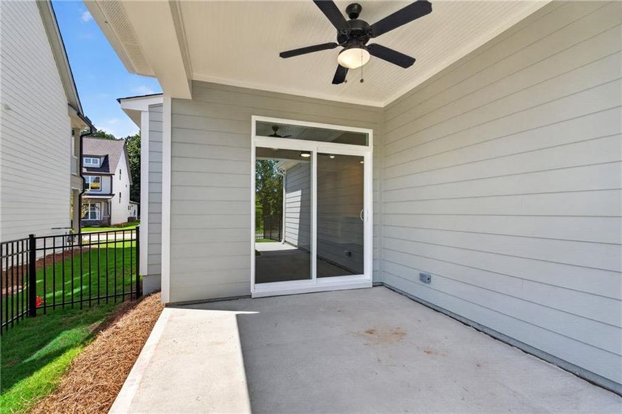 Exterior details and patio area of a home in Marble Tree, Ball Ground (Image 3).