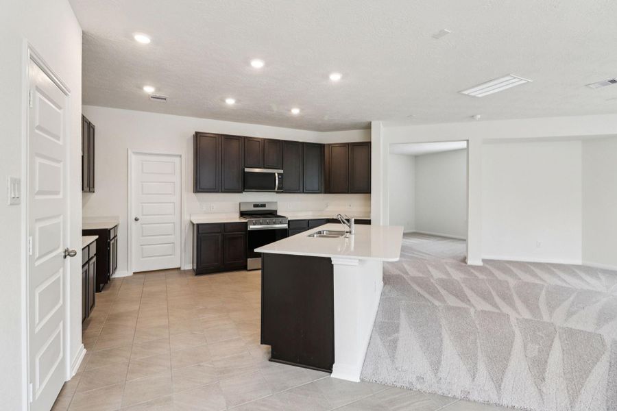From the kitchen is the entry to the Den.
