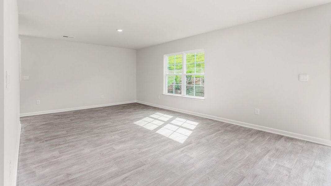 Representative unfurnished interior of a home built from the PENWELL by D.R. Horton in English Farm, Archdale (Image 11).