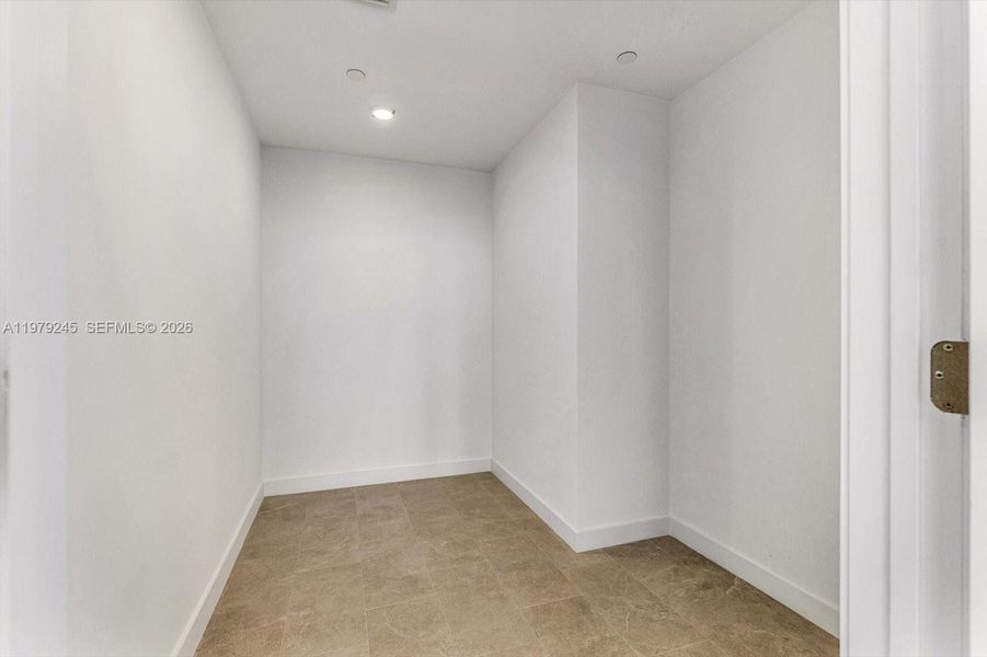 Spacious, unfurnished interior of a new home in Five Park, Miami Beach (Image 19).
