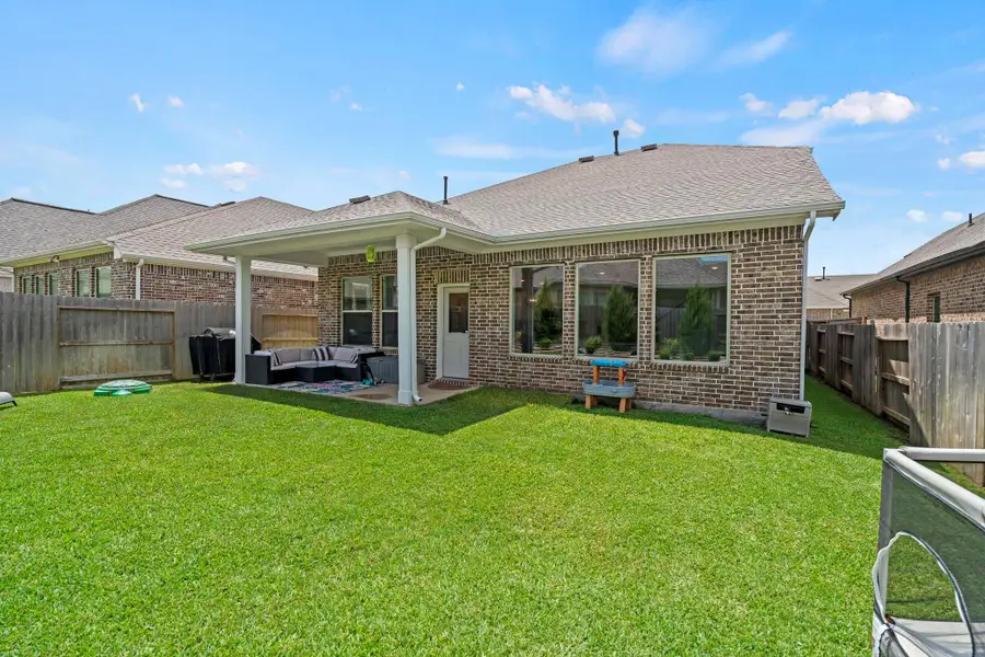 Exterior details and patio area of a home in , Magnolia (Image 23).