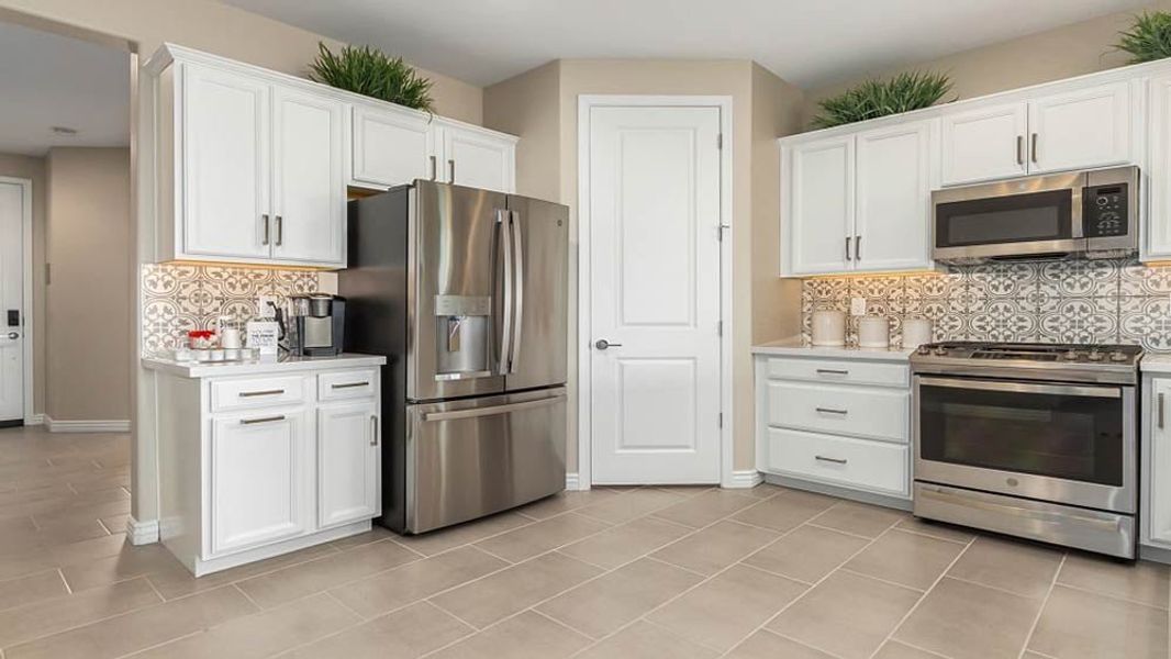 Representative furnished interior of a home built from the Harlow by Taylor Morrison in Stonehaven, Glendale (Image 9). Representative furnished interior of a home built from the Harlow by Taylor Morrison in Stonehaven, Glendale (Image 9).