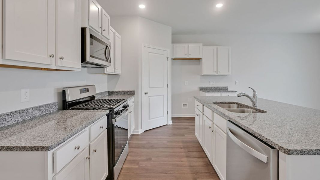 Representative furnished interior of a home built from the CALI by D.R. Horton in Vineyard Trail, Jacksonville (Image 6).