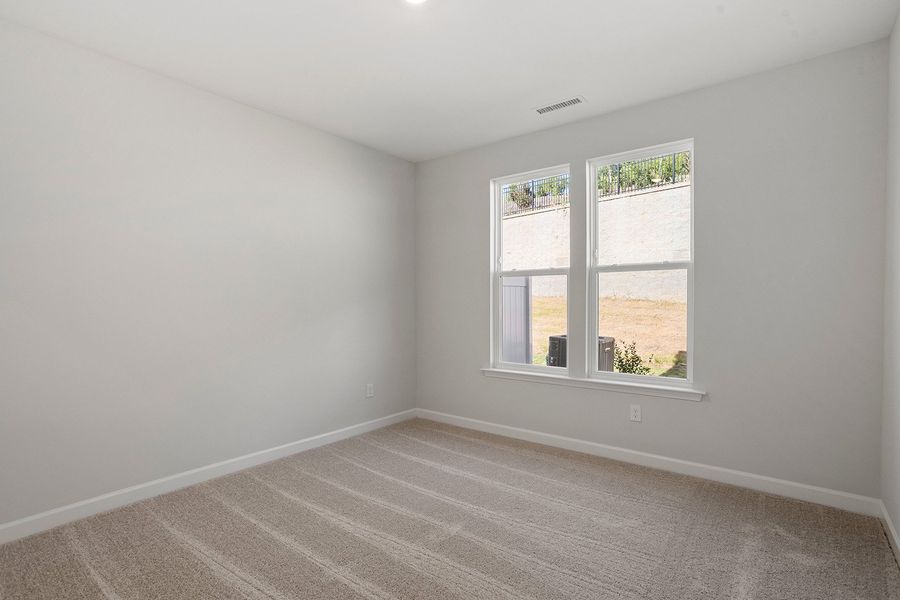 Spacious, unfurnished interior of a new home in Ovation at Sweetbrier, Durham (Image 19).