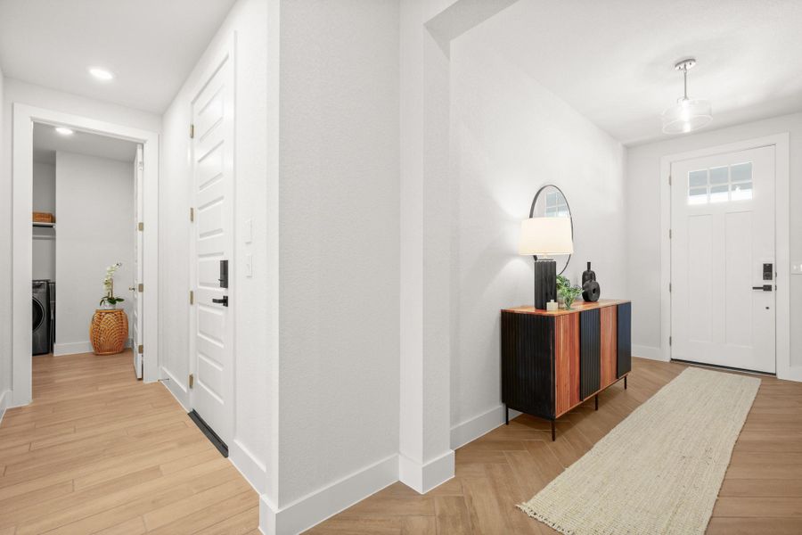 Entry way with herringbone floors