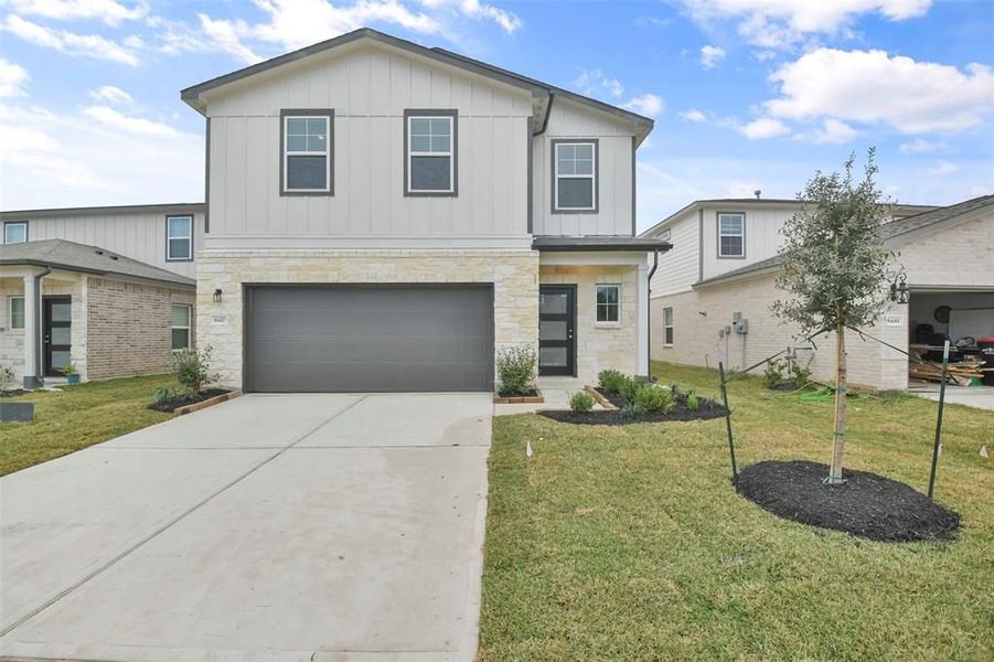Front exterior of a new home in Lakes at Black Oak, Magnolia, TX, highlighting curb appeal (Image 34).
