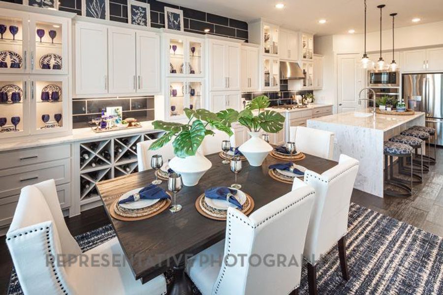 Dining room featuring recessed lighting and dark wood-type flooring Dining room featuring recessed lighting and dark wood-type flooring