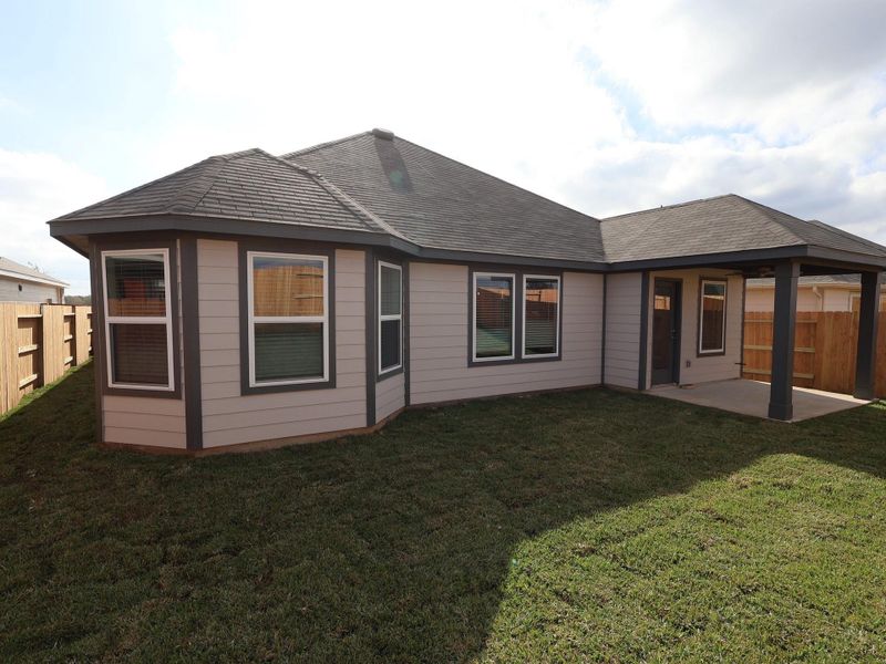 Exterior details and patio area of a home in Lone Star Landing, Montgomery (Image 20).