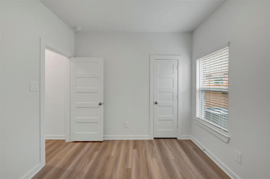 Spacious, unfurnished interior of a new home in Wildrye, Waller (Image 12).