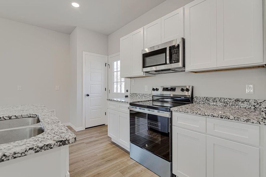 Furnished interior view inside a new home in , Azle (Image 4).