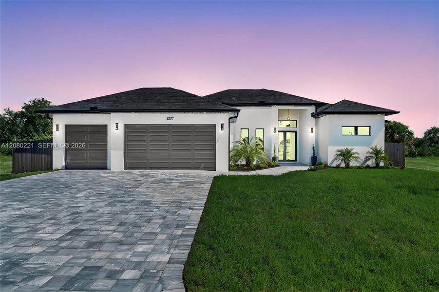 Front exterior of a new home in , Cape Coral, FL, highlighting curb appeal (Image 28).