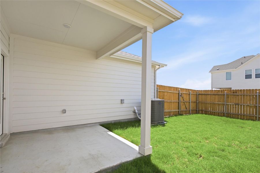 Exterior details and patio area of a home in Creeks Crossing, Elgin (Image 3). Exterior details and patio area of a home in Creeks Crossing, Elgin (Image 3).