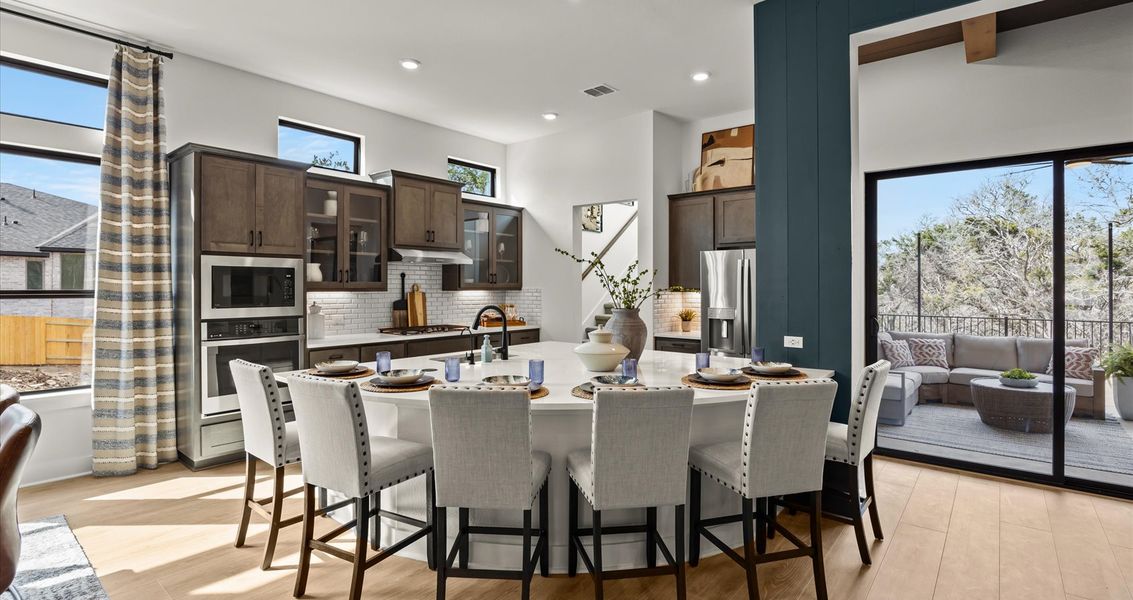Furnished interior view inside a new home in 6 Creeks, Kyle (Image 9).
