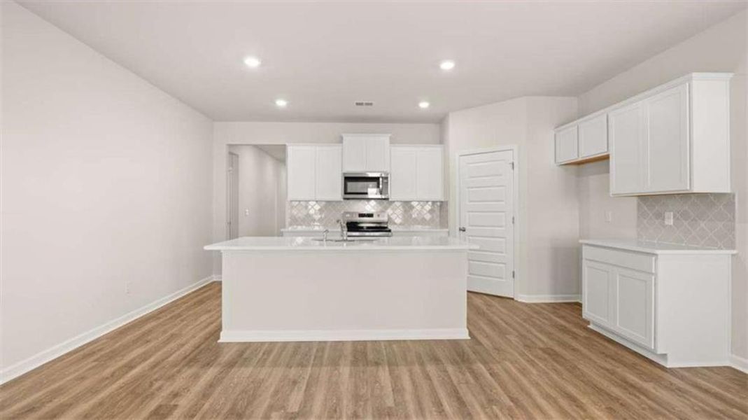 Furnished interior view inside a new home in Oakchase at Hampton, Hampton (Image 9). Furnished interior view inside a new home in Oakchase at Hampton, Hampton (Image 9).