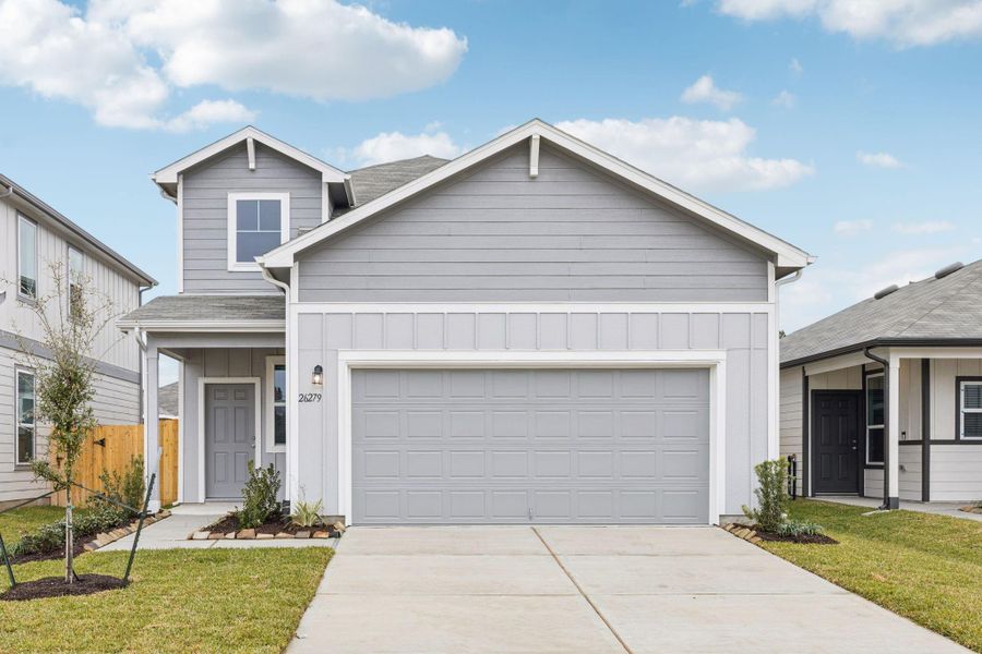 Front exterior of a new home in Decker Farms, Magnolia, TX, highlighting curb appeal (Image 1). Front exterior of a new home in Decker Farms, Magnolia, TX, highlighting curb appeal (Image 1).
