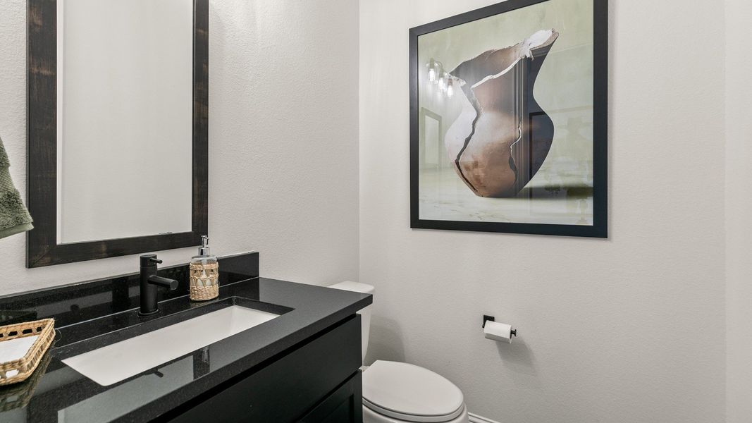 Representative furnished interior of a home built from the Rosewood by DRB Homes in Brookewater, Rosenberg (Image 7).