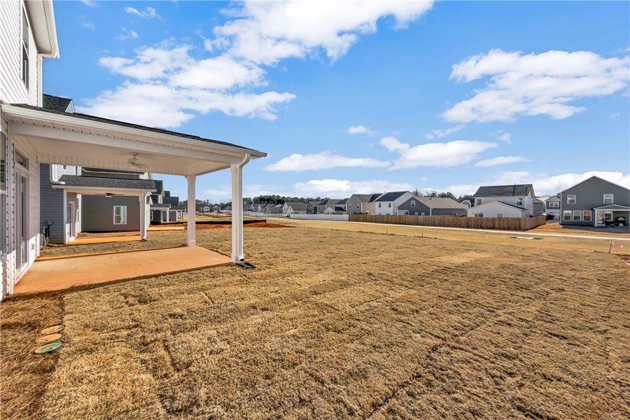 Exterior details and patio area of a home in Brownstone Park, Easley (Image 4).