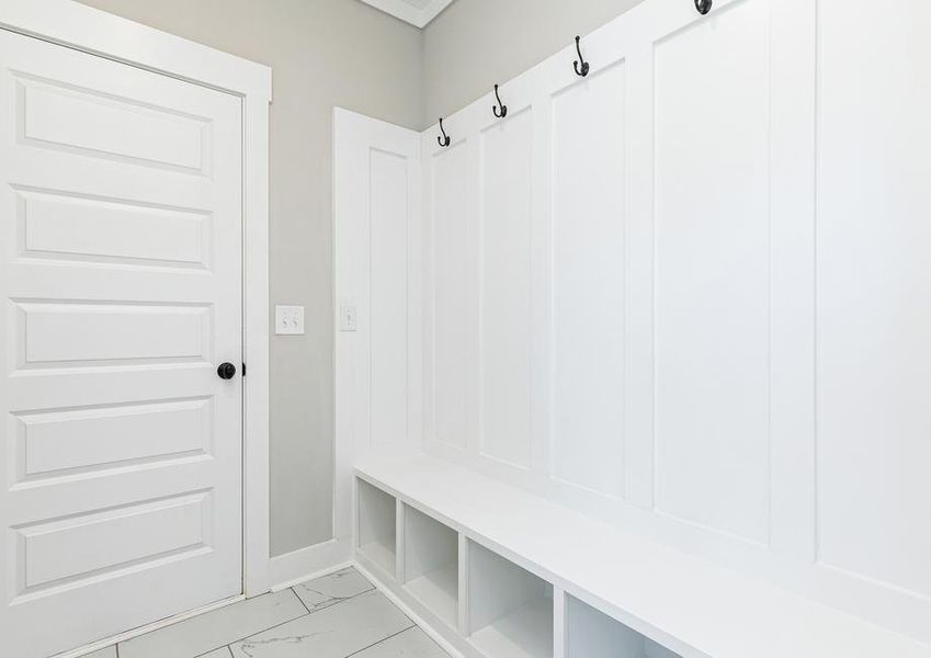 Mudroom with a bench and storage.