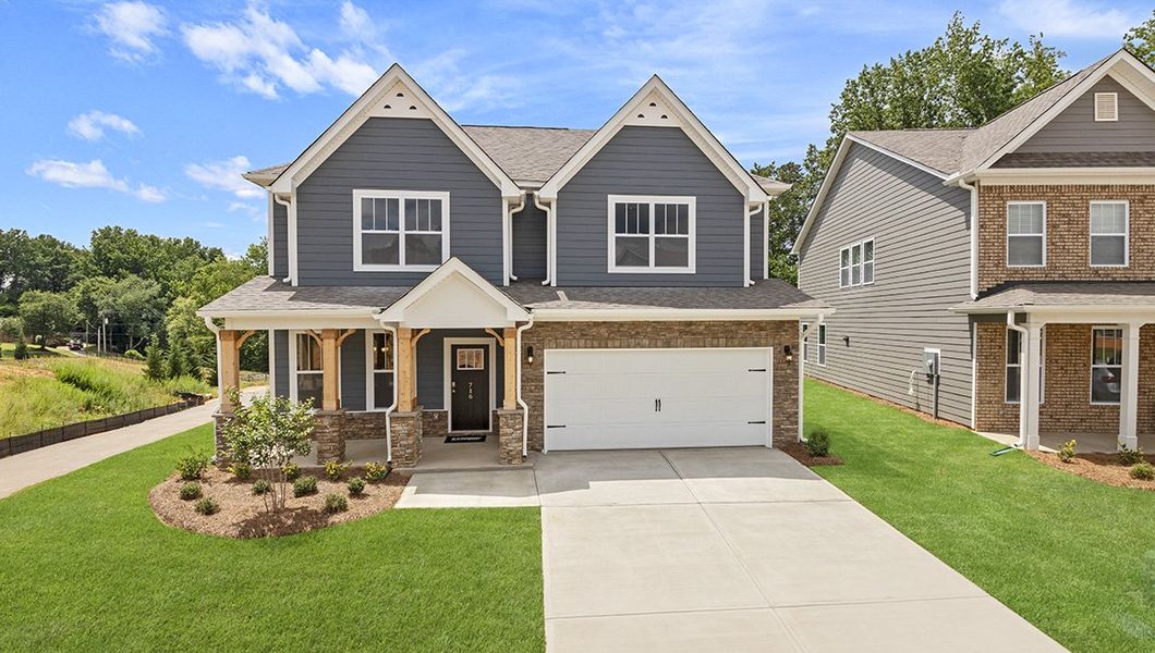 Front exterior of a new home in Brantley, Mooresville, NC, highlighting curb appeal (Image 1). Front exterior of a new home in Brantley, Mooresville, NC, highlighting curb appeal (Image 1).