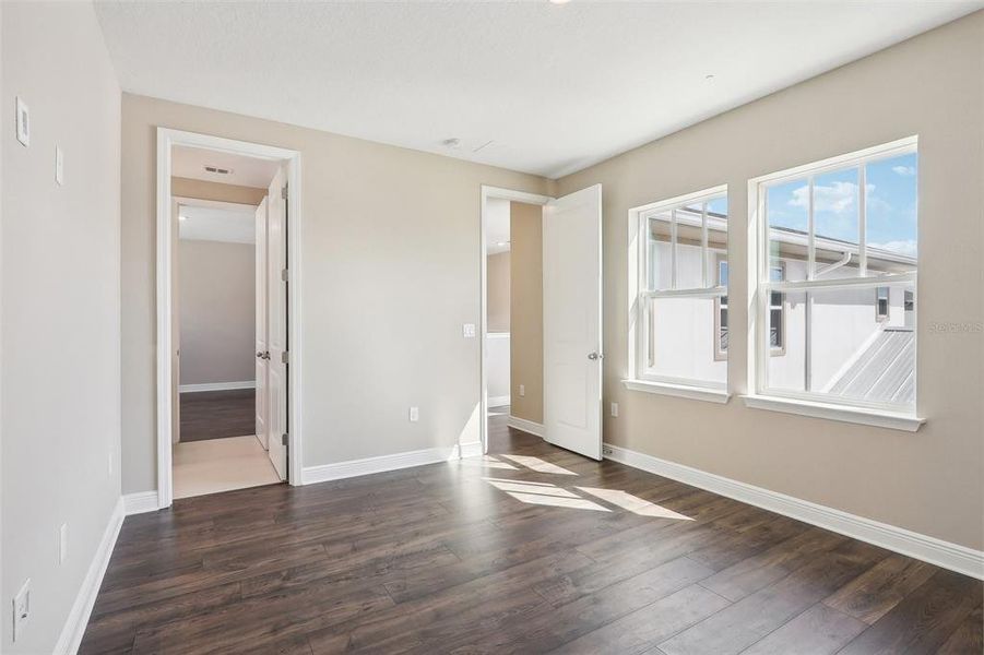 Spacious, unfurnished interior of a new home in Laureate Park, Orlando (Image 41).