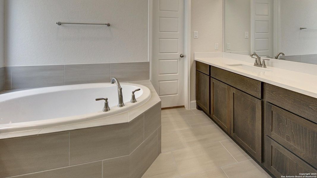 Furnished interior view inside a new home in Stevens Ranch 55', San Antonio (Image 9).