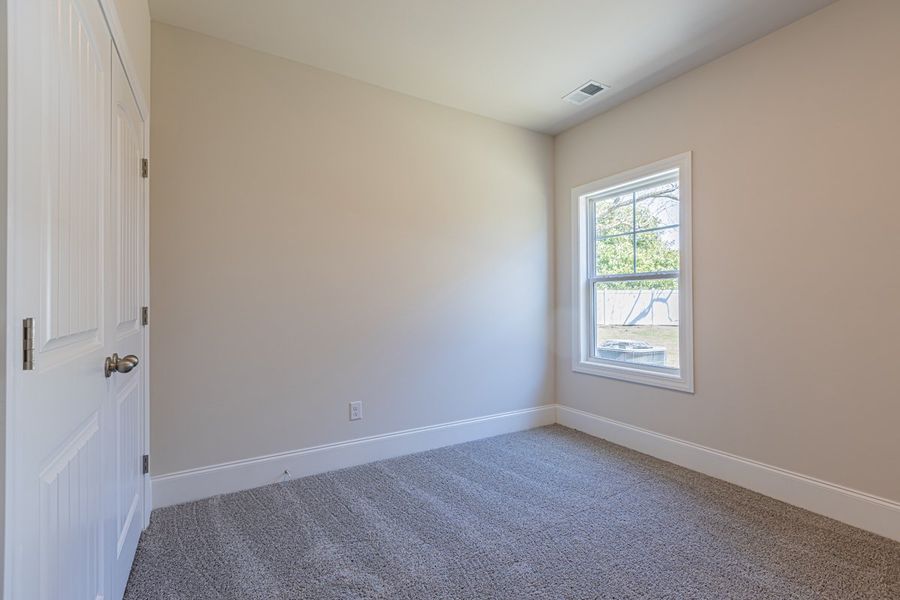 Representative unfurnished interior of a home built from the Habersham II by Great Southern Homes in Old Charleston Acres, Pelion (Image 35).