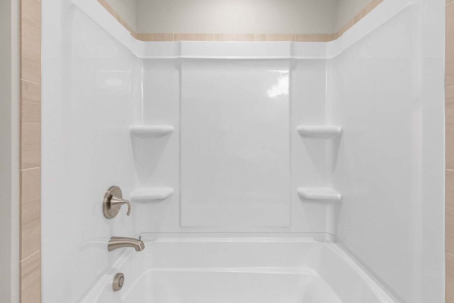 Representative furnished interior of a home built from the Magnolia by Caviness & Cates Communities in Bartlett Manor, Youngsville (Image 196).