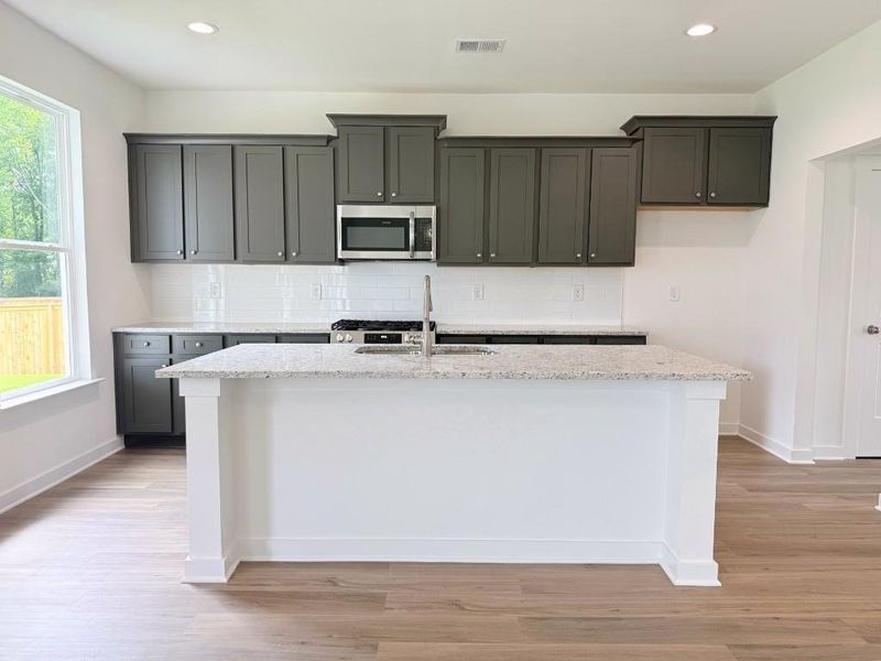 Furnished interior view inside a new home in Sutton’s Landing, Statham (Image 6).
