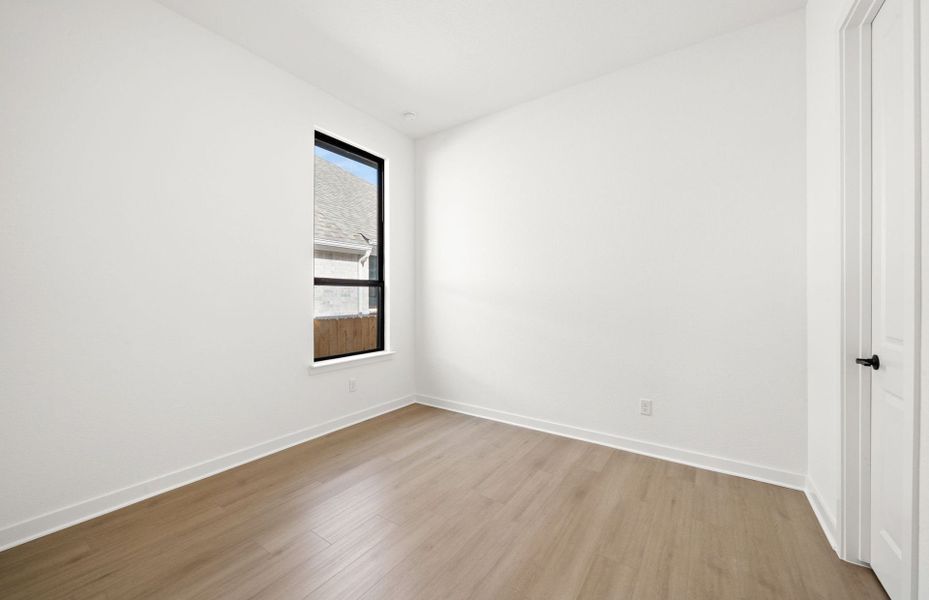 Representative unfurnished interior of a home built from the Dobbin by Pulte Homes in 6 Creeks, Kyle (Image 43).