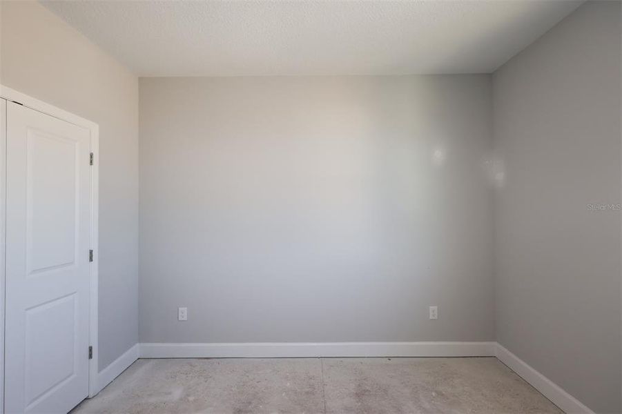 Spacious, unfurnished interior of a new home in Lake Star at Ovation, Winter Garden (Image 5).