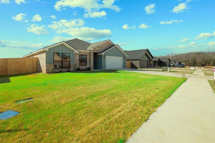 Exterior details and patio area of a home in , Lindale (Image 24).